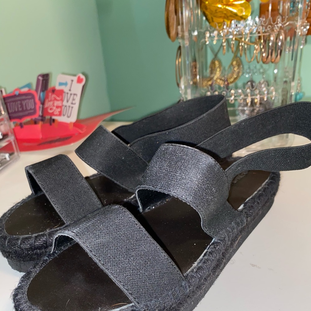 black platformed strap up sandals